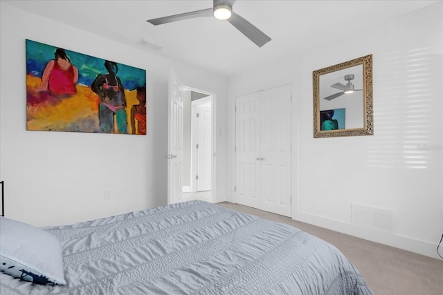 9 Crow Ct, Palm Coast, FL 32137 - carpeted bedroom with ceiling fan and a closet