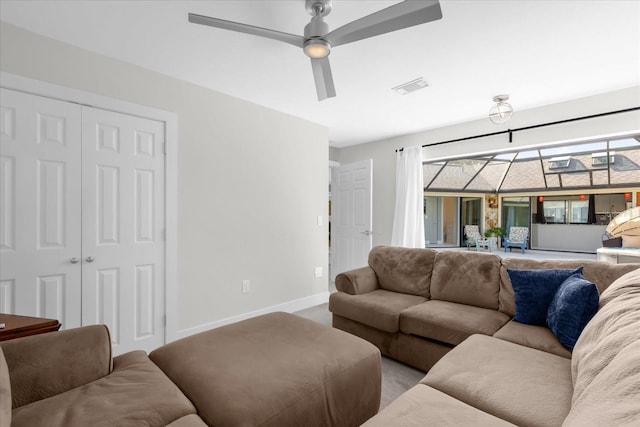 9 Crow Ct, Palm Coast, FL 32137 - living room featuring carpet floors and ceiling fan