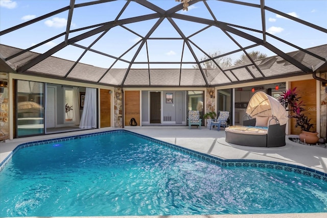 9 Crow Ct, Palm Coast, FL 32137 - outdoor pool featuring a patio and glass enclosure