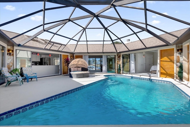 9 Crow Ct, Palm Coast, FL 32137 - outdoor pool featuring a patio area and glass enclosure