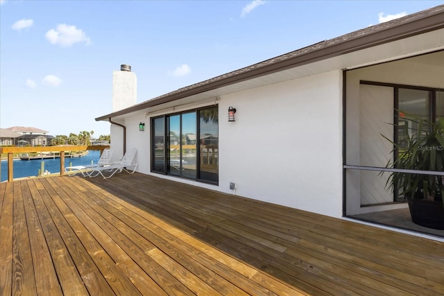 9 Crow Ct, Palm Coast, FL 32137 - wooden deck featuring a water view