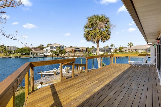 9 Crow Ct, Palm Coast, FL 32137 - dock area featuring a residential view and a water view