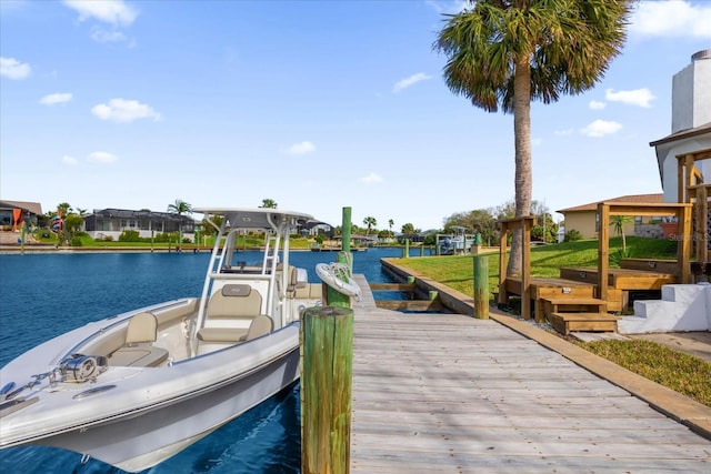 9 Crow Ct, Palm Coast, FL 32137 - dock area featuring boat lift and a water view