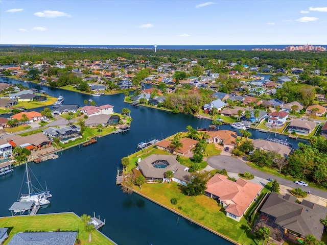 9 Crow Ct, Palm Coast, FL 32137 - aerial perspective of suburban area featuring a large body of water