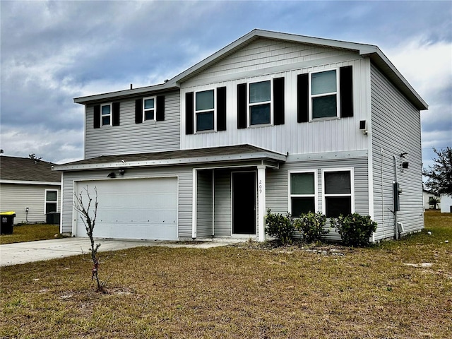 front of property featuring a garage and a front lawn