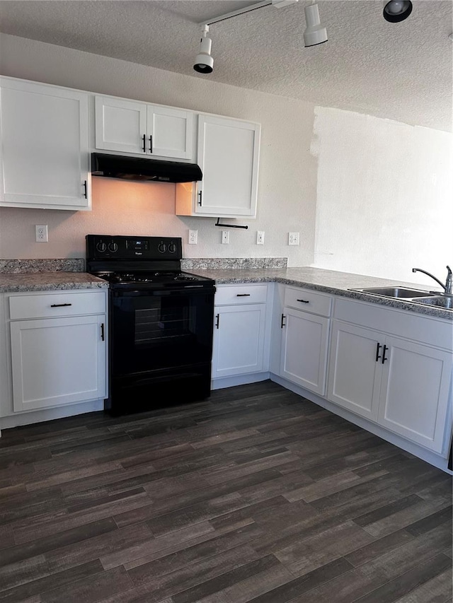 kitchen featuring dark wood-type flooring, white cabinets, sink, electric range, and a textured ceiling