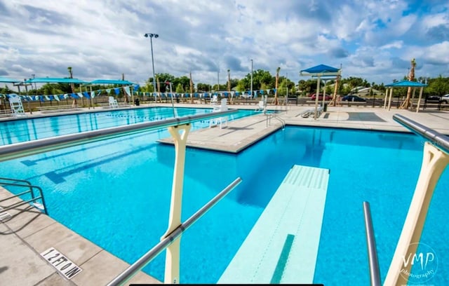 view of pool with a patio area