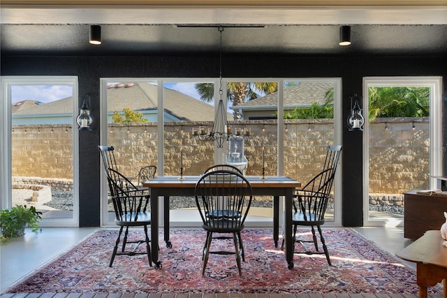 dining space with concrete floors