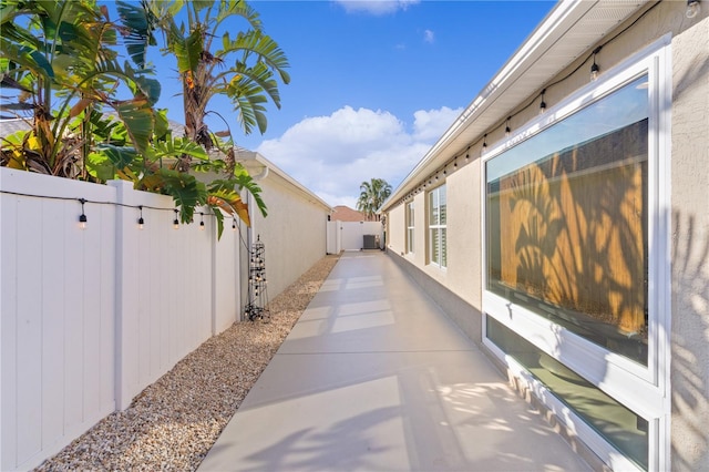 view of side of property featuring a patio