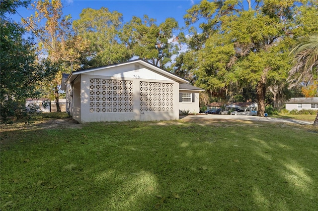 exterior space with a yard