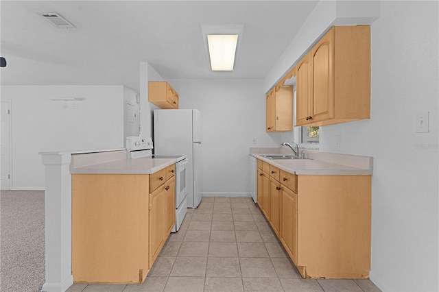 kitchen with white range with electric stovetop, light brown cabinets, sink, and light carpet