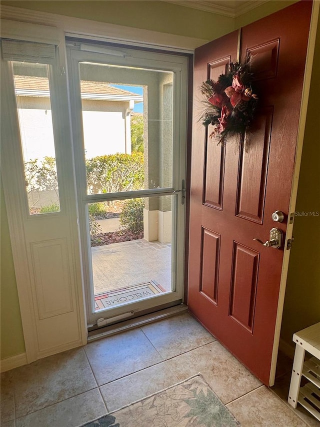 entryway with light tile patterned floors