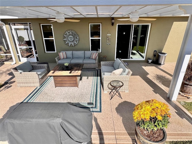 view of patio / terrace with ceiling fan and an outdoor hangout area