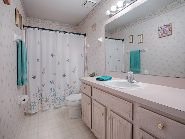 bathroom featuring vanity, a shower with curtain, and toilet