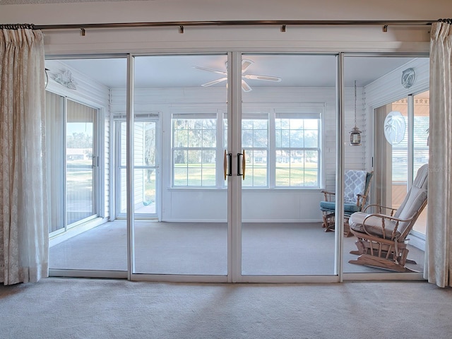 entryway with carpet floors