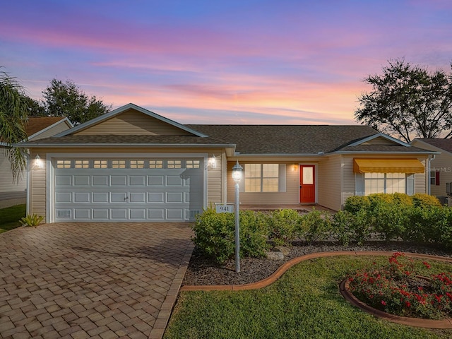 ranch-style house with a garage