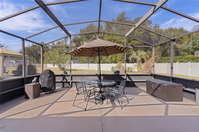 view of patio with a lanai and grilling area