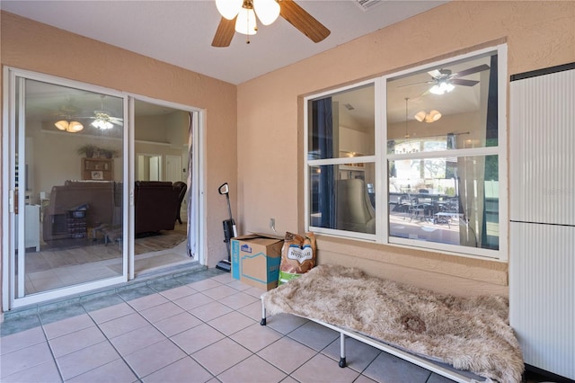 view of patio with ceiling fan