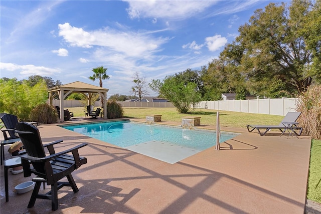 view of pool with a gazebo, pool water feature, a yard, and a patio