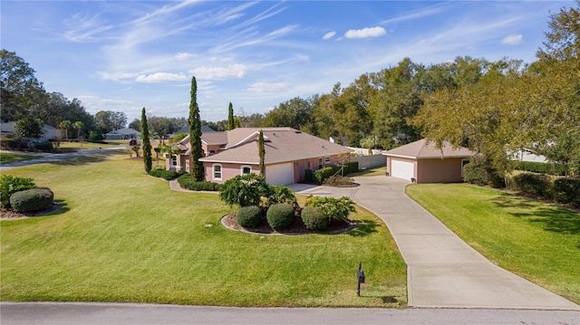 ranch-style home with a garage and a front yard