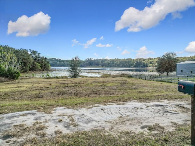 view of yard with a water view