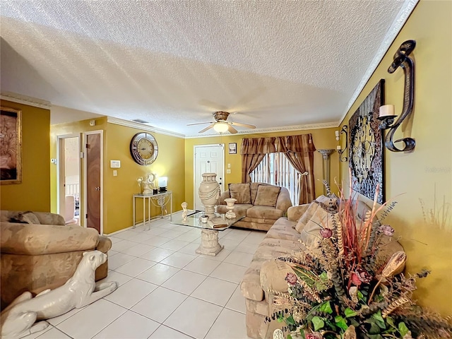 living room featuring ceiling fan, crown molding, light tile patterned flooring, and a textured ceiling