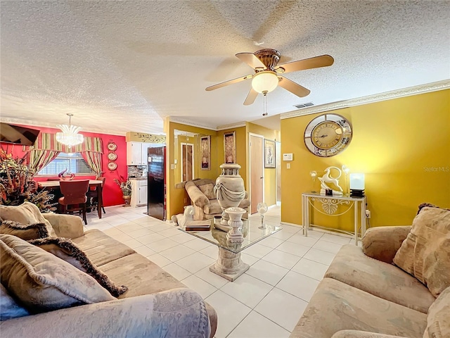 tiled living room featuring ceiling fan with notable chandelier, crown molding, and a textured ceiling