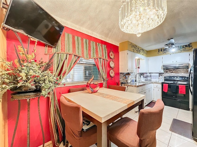 interior space featuring white cabinets, a textured ceiling, sink, light tile patterned floors, and black electric range