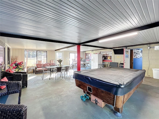 playroom with concrete flooring and pool table