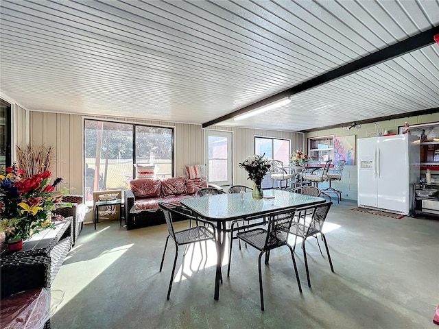 dining room featuring concrete floors