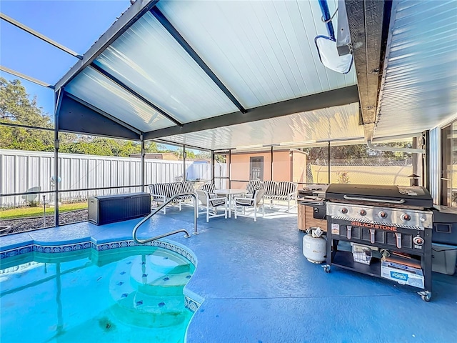 view of swimming pool with a grill, a lanai, and a patio