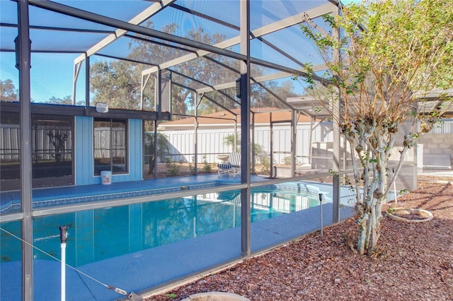 view of pool featuring a lanai