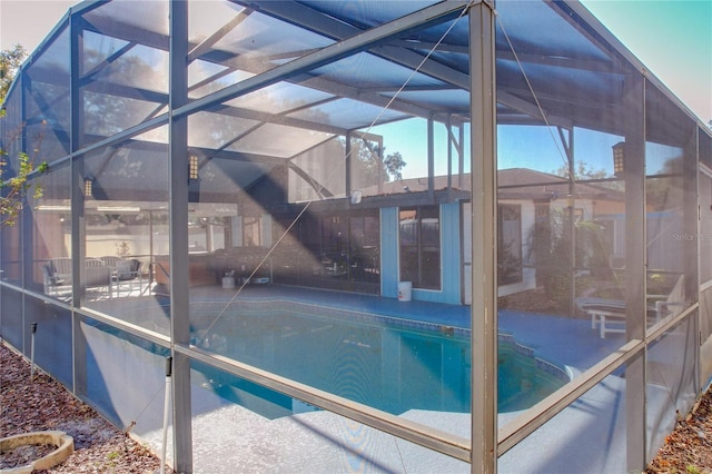 view of pool featuring a patio area and a lanai