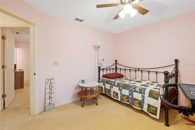 bedroom featuring ceiling fan and carpet floors