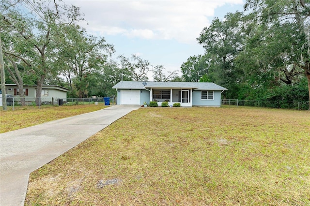 ranch-style house with a front yard and a garage