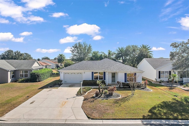 ranch-style home with a front lawn and a garage