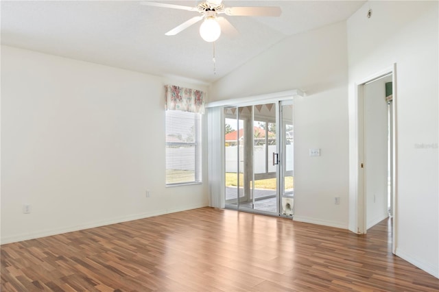 spare room with hardwood / wood-style floors, ceiling fan, and lofted ceiling