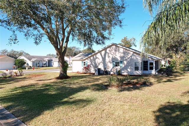 view of property exterior featuring a lawn