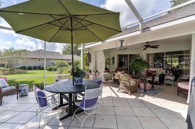 view of patio / terrace with glass enclosure and ceiling fan