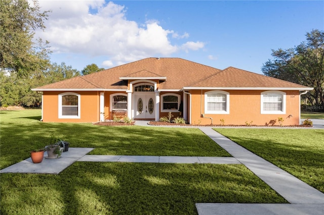 ranch-style home with a front yard