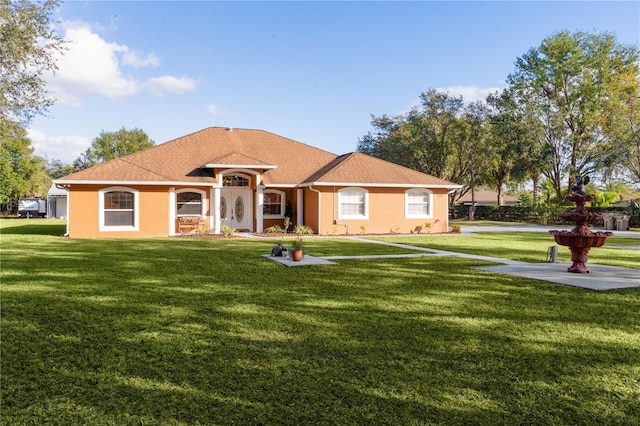 ranch-style house with a front yard