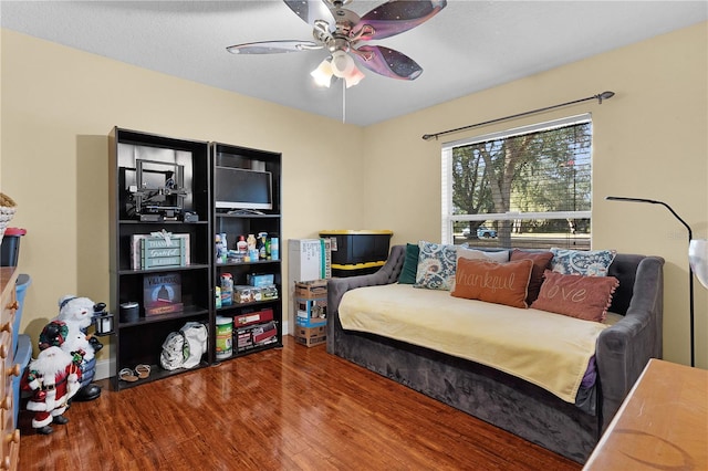 bedroom with hardwood / wood-style floors and ceiling fan