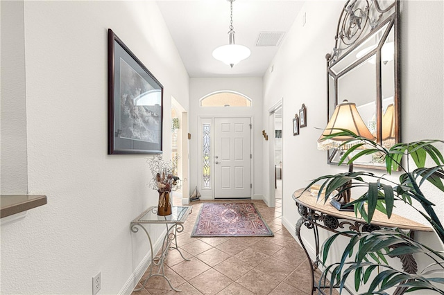 view of tiled foyer entrance