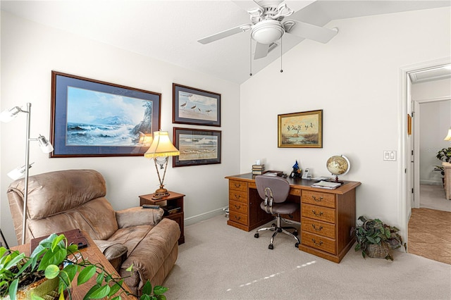 carpeted office featuring ceiling fan and vaulted ceiling