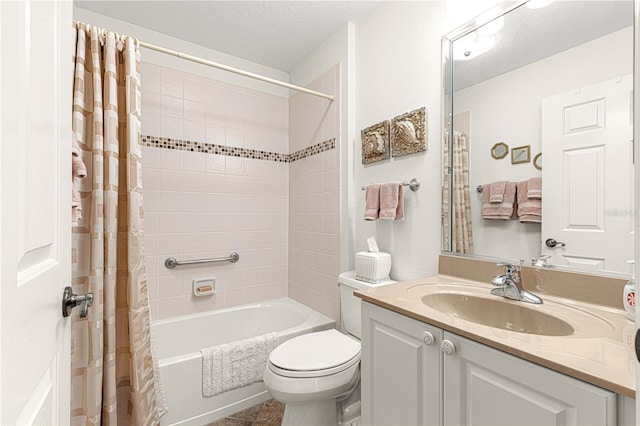 full bathroom with vanity, shower / bath combo, a textured ceiling, and toilet