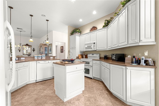 kitchen featuring kitchen peninsula, white appliances, white cabinets, a kitchen island, and hanging light fixtures