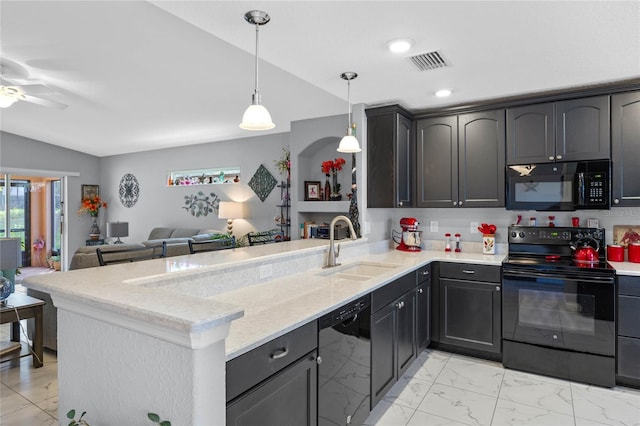 kitchen with black appliances, sink, vaulted ceiling, light stone countertops, and decorative light fixtures