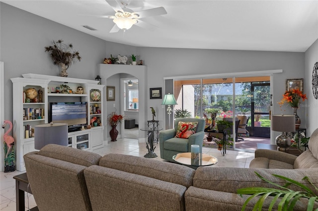 living room with vaulted ceiling, ceiling fan, and light tile patterned flooring