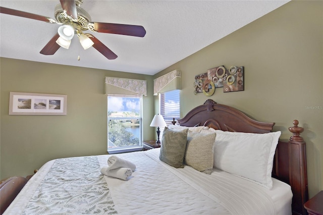 bedroom featuring ceiling fan