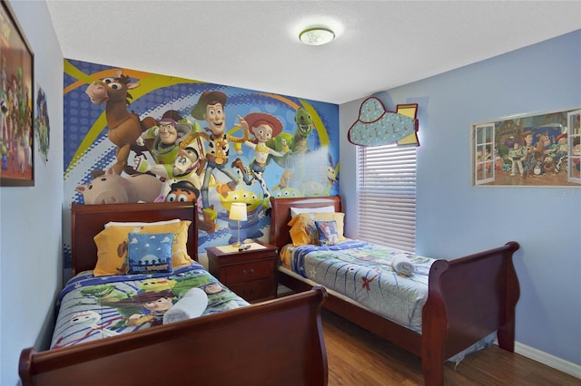 bedroom featuring hardwood / wood-style flooring